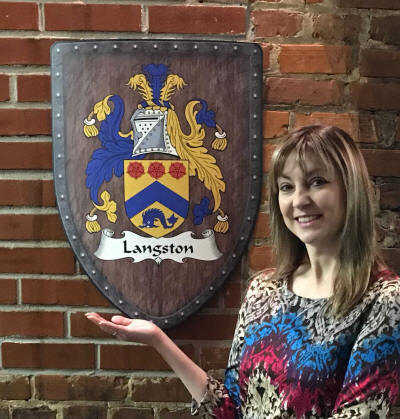 Melody with custom coat of arms on brick wall