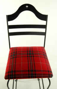 Red plaid upholstered bar stool seat closeup