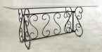 Wrought iron table base in black with glass top